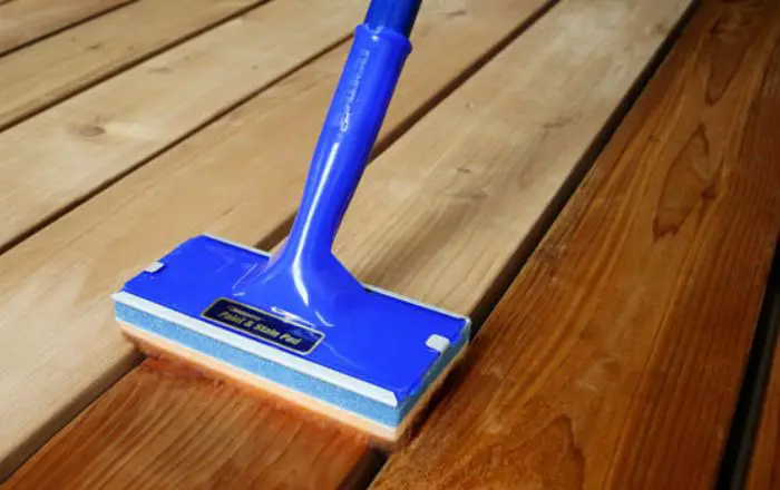 how to stain a deck with brush expert way to do it